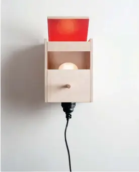  ??  ?? Arik Levy’s June Bird for Danese Milano started life as a bird hut before Levy added a light bulb to transform it into a wall light