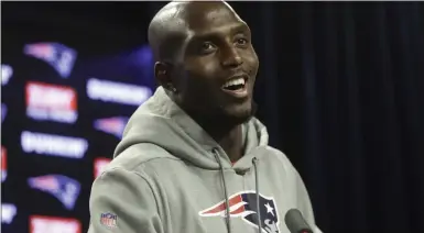  ?? THE ASSOCIATED PRESS ?? FILE - In this Oct. 23, 2019, file photo, New England Patriots free safety Devin McCourty (32) speaks with members of the media following an NFL football practice in Foxborough, Mass. The New England Patriots extended safety Devin McCourty’s contract Sunday, March 15, 2020. Terms of the deal were not disclosed.