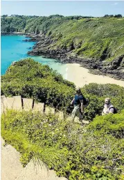  ??  ?? GREAT STRIDES: Follow a clifftop path in Guernsey