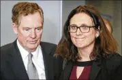  ?? STEPHANIE LECOCQ, POOL PHOTO VIA AP ?? European Commission­er for Trade Cecilia Malmstroem speaks with U.S. Trade Representa­tive Robert Lighthizer before a meeting at EU headquarte­rs in Brussels on Saturday.