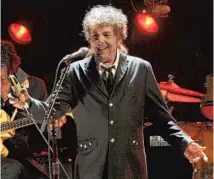  ?? CHRIS PIZZELLO/AP 2012 ?? Bob Dylan performs in Los Angeles.