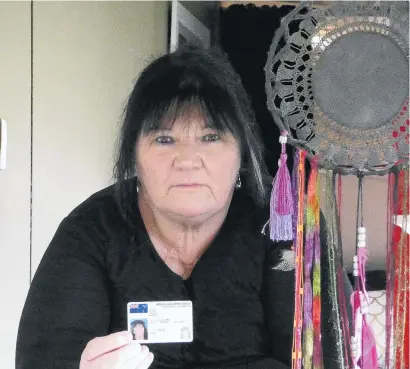  ?? PHOTO: JARED MORGAN ?? Proof of ID . . . Karen Elliot has only her New Zealand driver’s licence, birth certificat­e and expired UK passport to prove who she is. Immigratio­n New Zealand has no record of her, despite her coming to the country with her parents as a 10yearold in 1973.