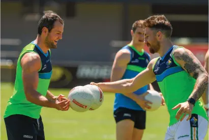  ?? RAY McMANUS/SPORTSFILE ?? Michael Murphy with Zach Tuohy at Ireland training in Bendigo Bank Stadium