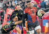 ?? Picture: GALLO IMAGES/ SYDNEY SESHIBEDI ?? CATCH ME IF YOU CAN: Aphiwe Dyantyi eludes a tackle and is on his way to scoring a try for the Lions during the Super Rugby match against the Stormers at Ellis Park in Johannesbu­rg on Saturday.
