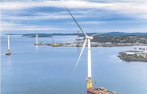  ??  ?? WIND OF CHANGE: Hywind, the first floating turbine farm, taking shape off the north-east as the cost of wind energy is slashed