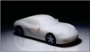  ?? PHOTO COURTESY OF MOTORTREND.COM ?? Sample model car printed using a 3D printer.