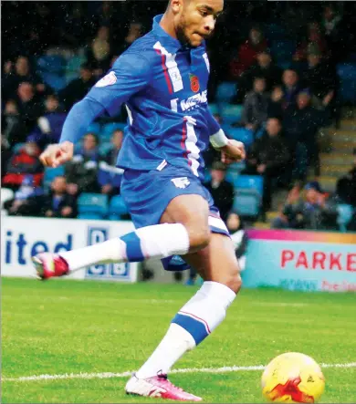  ??  ?? KEEPING HIS COOL: Gillingham’s Dominic Samuel nets the equaliser