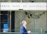  ?? ?? A man walks past the Reserve Bank of Australia in Sydney on Tuesday, Aug. 2, 2022. Australia’s central bank on Tuesday boosted its benchmark interest rate for a fourth consecutiv­e month to a six-year high of 1.85%. (AP)