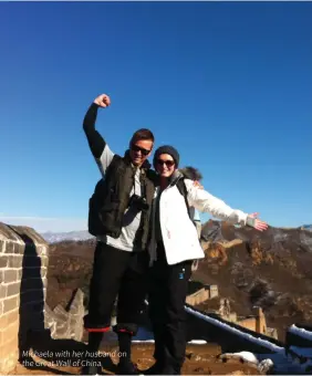  ??  ?? Michaela with her husband on the Great Wall of China