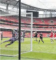  ?? //AFP ?? Plácida goleada del Arsenal