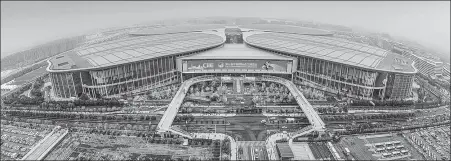  ?? WU KAI / XINHUA ?? A bird’s-eye view of the National Exhibition and Convention Center (Shanghai), which is shaped like a four-leaf clover.