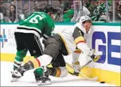  ?? Steph Chambers Getty Images ?? BRAYDEN McNABB is checked into the boards by Joe Pavelski during the Golden Knights’ 4-0 victory.