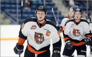  ?? NEWS FILE PHOTO ?? Medicine Hat Tigers captain James Hamblin leads his team back to the bench after scoring the opening goal on Feb. 2, 2019 at the Canalta Centre. On Monday, Hamblin was named Tigers MVP for this past shortened season.