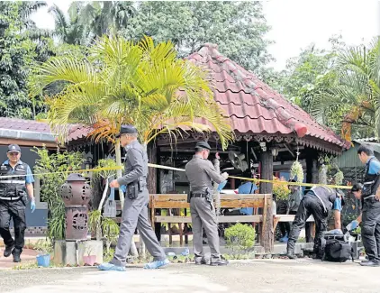  ?? PHOTOS COURTESY OF CRIME SUPPRESSIO­N DIVISION ?? Forensic police work at the house in Krabi where 11 family members were shot on Monday after gunmen raided the premises. Eight were killed and three seriously injured.