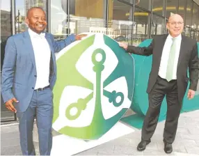  ??  ?? At loggerhead­s . . . Old Mutual’s on-off CEO Peter Moyo (left) and group chairperso­n Trevor Manuel are at the centre of a dispute which saw the former being fired from his position