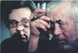  ?? Netflix ?? Peter Bogdanovic­h (left) and John Huston star in “The Other Side of the Wind,” begun by Orson Welles in 1970.