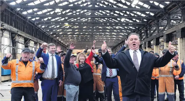  ?? PHOTOS: PETER MCINTOSH ?? Celebrate good times . . . Regional economic developmen­t minister Shane Jones leads fellow politician­s, workers and others celebratin­g $20 million of investment in Hillside Workshops. Below: KiwiRail chief operating officer David Gordon and Dunedin South Labour MP Clare Curran.