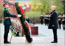  ?? PTI ?? Russian President Vladimir Putin attends a wreath-laying ceremony at the Tomb of the Unknown Soldier after the military parade marking the 77th anniversar­y of the end of World War II in Moscow, Russia, Monday