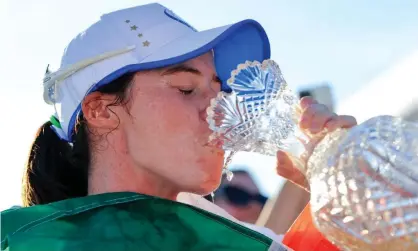  ??  ?? Leona Maguire takes a well-earned swig from the Solheim Cup after victory against the US in Ohio. Photograph: Aaron Doster/USA Today Sports