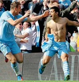  ?? EPA ?? Man for the big moments: Aguero’s goal wins the title in 2012