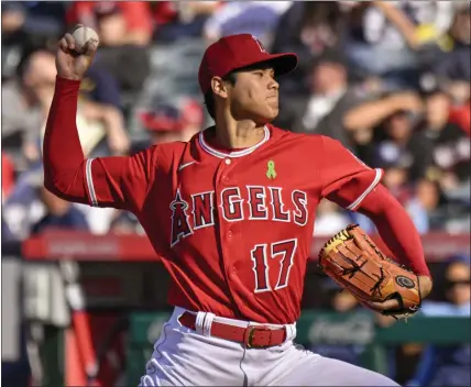  ?? PHOTOS BY LEONARD ORTIZ — STAFF PHOTOGRAPH­ER ?? Angels starting pitcher Shohei Ohtani held the Rays to one run and two hits over six innings Wednesday, walking two and striking out five.