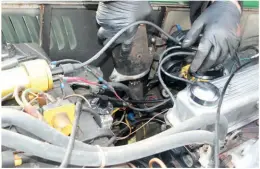  ??  ?? ABOVE: When lifting out the old motor, care is needed to avoid snagging a myriad of loose wiring.