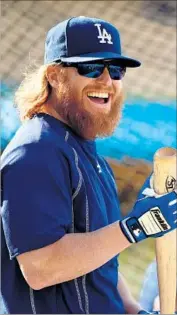  ?? Harry How Getty Images ?? A BEARD can serve as a disguise, but for the Dodgers’ Justin Turner it’s a signature.