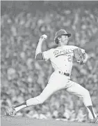  ?? AP FILE PHOTO ?? American League’s Don Sutton of the Los Angeles Dodgers pitchs in the 1977 All-Star Game in New York.