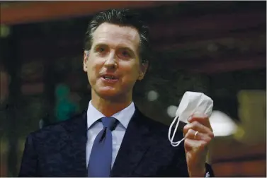  ?? THE ASSOCIATED PRESS FILE ?? Gov. Gavin Newsom has unveiled the next phase of vaccinatio­ns, which will include a mix of people at least 75 years old and some essential workers.