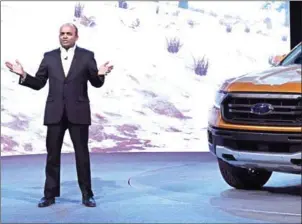  ?? JEWEL SAMAD/AFP ?? Raj Nair, Ford Motor Company executive vice president and president of North America, introduces the 2019 Ford Ranger midsize truck during the press preview at the 2018 North American Internatio­nal Auto Show in Detroit, Michigan, on January 14.