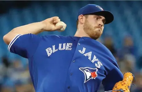  ?? STEVE RUSSELL/TORONTO STAR ?? Joe Biagini earned the win for the Jays with five shutout frames in his second start, unleashing a career-high 68 pitches at the Rogers Centre.