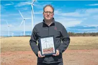  ??  ?? Adam Fenech, director of the University of PEI Climate Lab, is seen in Norway, near North Cape, where the Gulf of St. Lawrence meets the Northumber­land Strait. Erosion along the coast is threatenin­g some of the wind turbines there.