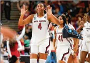  ?? JOSHUA BOUCHER/THE STATE/TNS ?? South Carolina forward Aliyah Boston celebrates defeating UCLA in the NCAA Tournament Sweet 16 in Greenville, South Carolina, on Saturday. The top-seeded Gamecocks play Maryland today in the Elite Eight at 7 p.m. on ESPN.