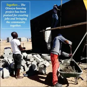  ??  ?? Together… The Otweya housing project has been praised for creating jobs and bringing the community together.