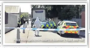  ??  ?? Police investigat­ing the robbery in Boothferry Road, west Hull