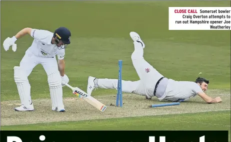  ??  ?? CLOSE CALL Somerset bowler Craig Overton attempts to run out Hampshire opener Joe Weatherley