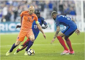  ??  ?? Netherland­s forward Arjen Robben, left, in action against France.