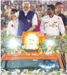  ?? — PTI ?? Prime Minister Narendra Modi waves at supporters as he arrives for a public meeting ahead of Lok Sabha elections in Salem, Tamil Nadu, on Tuesday.