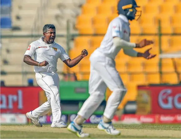  ??  ?? Rangana Herath, top left, is the first left-arm spinner to reach 400 Test wickets. Mohammed Amir, right, became the Sri Lankan’s 100th wicket against Pakistan