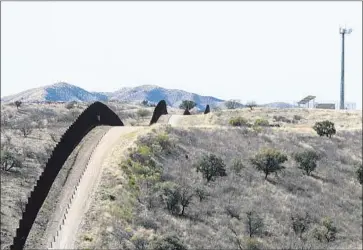  ?? Brian van der Brug Los Angeles Times ?? PRESIDENT Trump’s 2019 budget proposes $1.6 billion for a border wall. Above, a fence west of Nogales, Ariz.