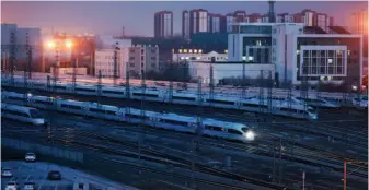  ??  ?? January 31, 2018: High-speed trains at the Beijing South Railway Station. In recent years, the rapid developmen­t of China’s high-speed rail has greatly boosted the country’s economic developmen­t. by Xu Xun/china Pictorial