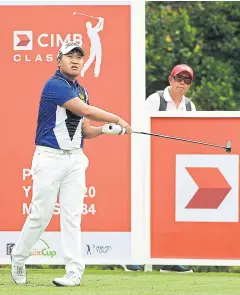  ??  ?? Poom Saksansin tees off during the first round yesterday.