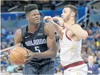  ??  ?? Magic rookie and Texas alum Mo Bamba said putting a Bulldog up against a Longhorn is no contest. JOHN RAOUX/AP