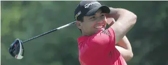  ?? SETH WENIG/THE ASSOCIATED PRESS ?? Jason Day smiles as he warms up on the sixth tee during a practice round for the PGA Championsh­ip at Baltusrol Golf Club in Springfiel­d, N.J., on Wednesday.