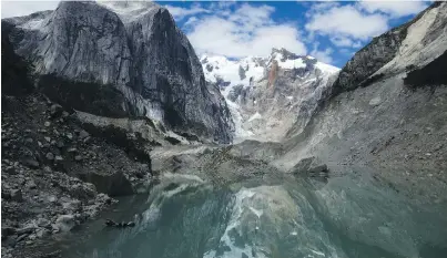  ?? STEPHAN HARRISON VIA CP ?? Chileno glacial lake in the Patagonia region of Chile. Meltwater from shrinking glaciers is creating vast new lakes that could eventually pose a massive flooding threat, says newly published research.
