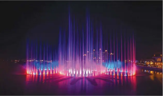 ??  ?? The attraction is the only multicolou­red fountain in Dubai.