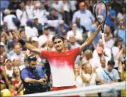  ?? ANDRES KUDACKI — THE ASSOCIATED PRESS ?? Roger Federer had a tough time but eventually dispatched Mikhail Youzhny in five sets at the U.S. Open.