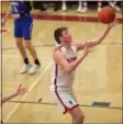  ?? RANDY MEYERS — FOR THE MORNING JOURNAL ?? Jacob Schmitz of Firelands drives and scores on a third quarter fast break against Open Door on Feb. 9.