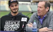  ?? DENVER POST FILE PHOTO ?? Rockies third baseman Nolan Arenado, left, smiles listening to Rockies owner Dick Monfort during a press conference at Salt River Fields at Talking Stick in Scottsdale, Ariz., on Feb. 27, 2019.