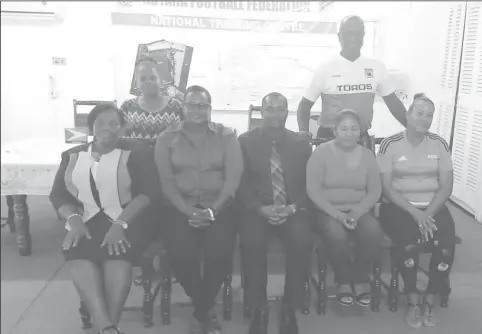  ??  ?? GFF President Wayne Forde (centre), posing alongside the recently elected executive of the National Associatio­n for Women’s Football (NAWF)